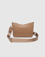 The Louenhide Linda Caramel Crossbody Bag is the new everyday staple. A classic silhouette meets modern design, this small crossbody bag is a little dressier than your typical everyday style. Wear her crossbody by day or change the straps to use as a shoulder bag by night. Stylish, practical and spacious enough to fit your essentials and more, this multiwear bag is as practical as she is versatile. Elevate your everyday with the Linda Caramel Crossbody Bag by your side.