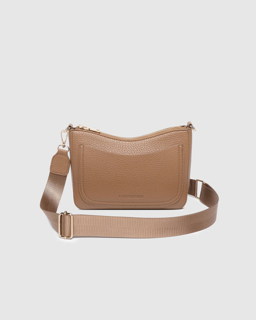 The Louenhide Linda Caramel Crossbody Bag is the new everyday staple. A classic silhouette meets modern design, this small crossbody bag is a little dressier than your typical everyday style. Wear her crossbody by day or change the straps to use as a shoulder bag by night. Stylish, practical and spacious enough to fit your essentials and more, this multiwear bag is as practical as she is versatile. Elevate your everyday with the Linda Caramel Crossbody Bag by your side.