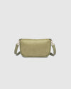 The Louenhide Saylor Sage Green Crossbody Bag brings a bold yet refined edge to your everyday styling. With its soft faux suede finish and sleek baguette-shaped silhouette, this cross body bag with chain detailing blends texture and refinement in all the right ways. Designed to be worn with ease but styled to stand out, the Saylor Sage Green moves effortlessly from day to night, adding impact to your layered winter looks. Wherever the day leads, this chain strap handbag is the finishing touch that completes