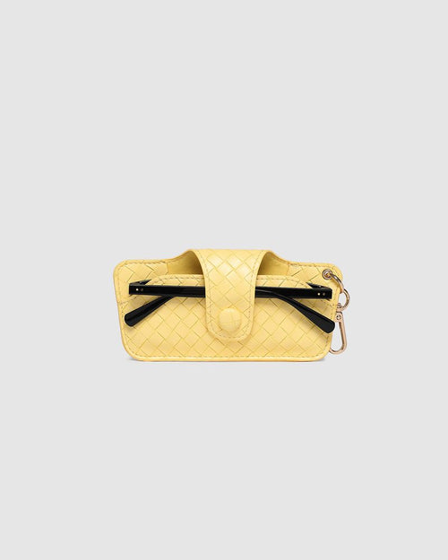 The Louenhide Skittle Sunglass Case is the perfect blend of style and functionality for your everyday eyewear. For ultimate convenience, effortlessly attach to your keys or handbag with the light gold hardware keyring clasp. Without compromising on style, the exterior features a gorgeous vegan leather, while the interior is lined with soft suede material to keep your everyday eyewear protected. Whether it's your favourite sunglasses or your reading glasses, they will stay protected and safe with the secure 
