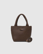Internal Features	Base Plate
Handle Height	14cm and Falls Flat on Body
PU Strap	Adjustable and Detachable 99-114cm PU Strap
Closure	Magnetic Clasp
Body Material	Polyurethane Vegan Leather 100%
Hardware	Light Gold
Dimensions	W21 x H20 x D8cm
Weight	0.55kg