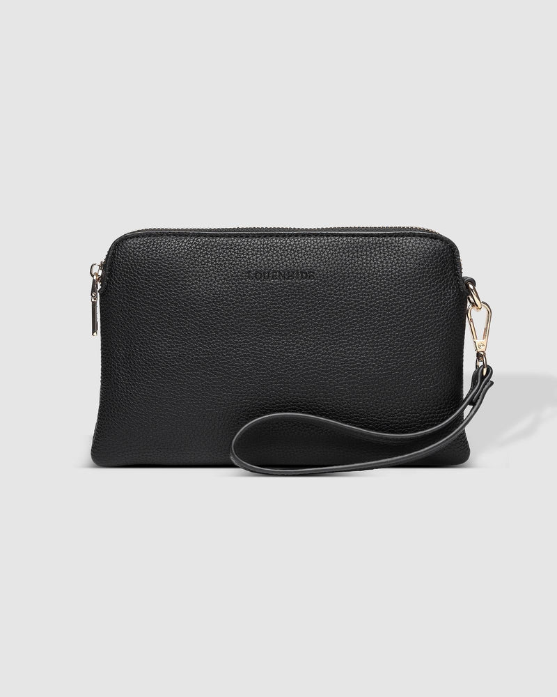 The Louenhide Poppy Clutch strikes the perfect balance between minimalism, versatility and style. She's the ideal addition to your tote as a sleek clutch wallet or the perfect grab-and-go companion when carried by the wristlet. Created with soft vegan leather with a compact design, your essentials are organised in the backside pocket while held safe with the secure zip closures. Never go without your essentials and easily adapt to every occasion with the Poppy Clutch.