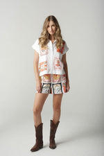 A cute cropped shirt in 100% cotton shirt featuring C+P+S signature Rodeo Print on the front. This cap sleeve is cool in our summer months and is the perfect foil with the Rodeo Print shorts and cropped pants which are also a part of this Rodeo range.