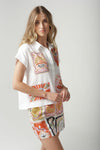 A cute cropped shirt in 100% cotton shirt featuring C+P+S signature Rodeo Print on the front. This cap sleeve is cool in our summer months and is the perfect foil with the Rodeo Print shorts and cropped pants which are also a part of this Rodeo range.