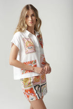 A cute cropped shirt in 100% cotton shirt featuring C+P+S signature Rodeo Print on the front. This cap sleeve is cool in our summer months and is the perfect foil with the Rodeo Print shorts and cropped pants which are also a part of this Rodeo range.