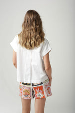 A cute cropped shirt in 100% cotton shirt featuring C+P+S signature Rodeo Print on the front. This cap sleeve is cool in our summer months and is the perfect foil with the Rodeo Print shorts and cropped pants which are also a part of this Rodeo range.