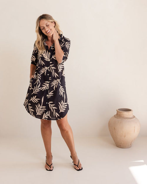 This easy to wear 100% soft cotton fabric of black with a beige leaf print is a great addition to your summer wardrobe. Brand is Seesaw.