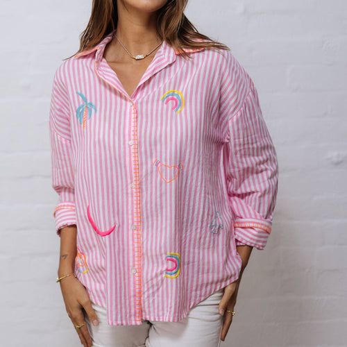 A 100% soft cotton shirt in pink stripes with fluoro embroidered summery motifs and blanket stitching at the cuffs, collar and front.&nbsp; "La Dolce Vita" is embroidered across the back.