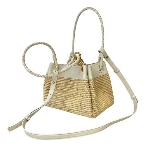 This cute little grab bag in raffia and milk leather also comes with a shoulder strap and an extra zipped leather pouch, Measures 21cm x 14cm x 15cm