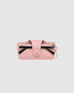 The Louenhide Skittle Sunglass Case is the perfect blend of style and functionality for your everyday eyewear. For ultimate convenience, effortlessly attach to your keys or handbag with the light gold hardware keyring clasp. Without compromising on style, the exterior features a gorgeous vegan leather, while the interior is lined with soft suede material to keep your everyday eyewear protected. Whether it's your favourite sunglasses or your reading glasses, they will stay protected and safe with the secure 