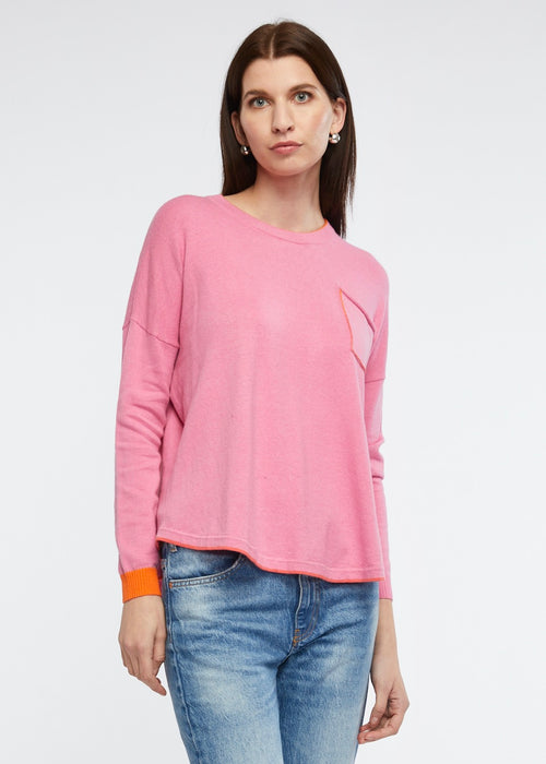 <p>This soft and lightweight pullover will add some colour and fun to your winter wardrobe. Soft musk with trims of orange on the cuffs, front pocket and neckline, it has small side splits and a scooped hemline. You'll love it's ease of wear.&nbsp;</p> <p>5% cashmere</p> <p>95% cotton</p>