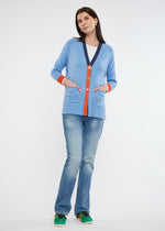 This cotton and cashmere cardi from Zaket & Plover in a chambray combo offers a beautiful blue with trims in dark denim and orange> Large pearly grey buttons are a feature as are the front pockets.