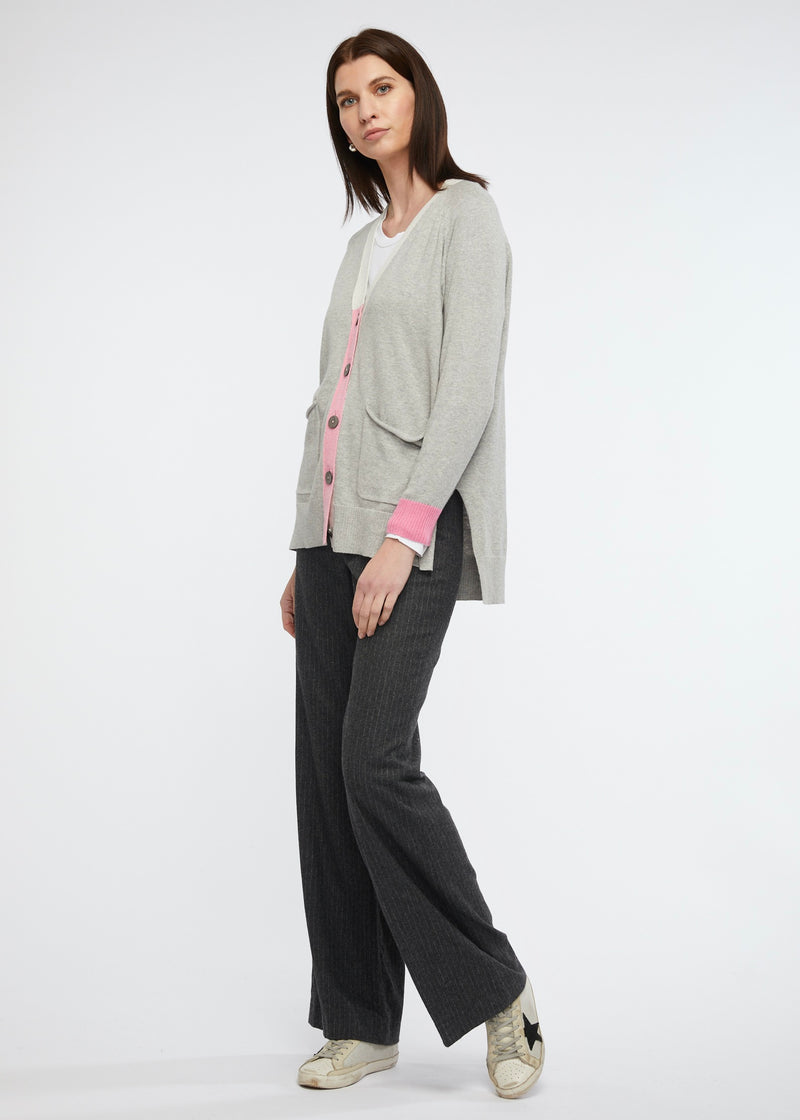 <p>A beautiful longer length, soft cardi with musk trim, large buttons, pockets, side splits and an uneven hemline. This is one to love for a very long time.</p> <p>5% cashmere</p> <p>95% cotton,</p>