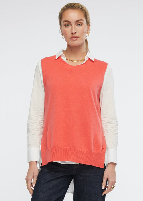 A simple round necked vest with side splits and knitted from a cotton and cashmere blend. Colour is dubarry.