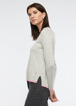 This light weight crew necked jumper is perfect for your casual winter wardrobe. The stripe of grey and white is complimented by trims in a pink. Knitted from cotton and cashmere by Zaket &amp; Plover.