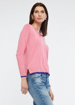 This light weight crew necked jumper is perfect for your casual winter wardrobe. The stripe of two toned pink is complimented by trims in a dark blue. Knitted from cotton and cashmere by Zaket & Plover.