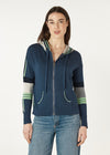  softly knitted hoodie of 5% cashmere and 95% cotton features a zipped front, pockets and feels beautiful to wear. The base colour is navy denim with a grey hood (that is edged with green stripes), Green and grey stripes and checks are features on the arms and also the back.