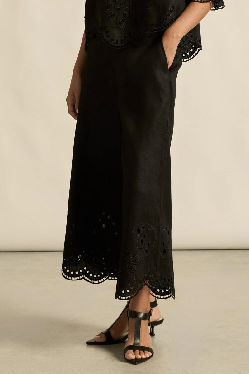 Embroidered with a delicate floral motif and finished with a scalloped hem, the apprise pant is a refined take on vacation dressing.&nbsp;

100% linen
bespoke embroidery with scalloped edge
cropped, wide-leg silhouette
high-waisted fit with side zip and clasp
elasticated back waistband for comfort
functional side pockets
designed to pair with the dawn top as a vacation-ready set