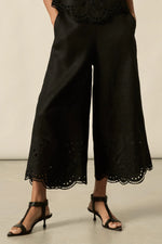Embroidered with a delicate floral motif and finished with a scalloped hem, the apprise pant is a refined take on vacation dressing.&nbsp;

100% linen
bespoke embroidery with scalloped edge
cropped, wide-leg silhouette
high-waisted fit with side zip and clasp
elasticated back waistband for comfort
functional side pockets
designed to pair with the dawn top as a vacation-ready set