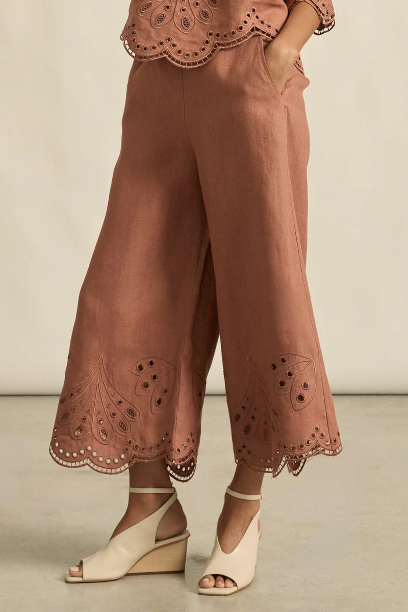 100% linen
bespoke embroidery with scalloped edge
cropped, wide-leg silhouette
high-waisted fit with side zip and clasp
elasticated back waistband for comfort
functional side pockets
designed to pair with the dawn top as a vacation-ready set