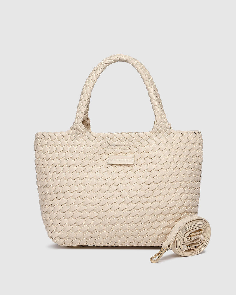 The Louenhide Baby Cruiser Malt Woven Tote Bag is the epitome of laid-back elegance. To elevate a past season favourite, the Cruiser, this women's woven tote bag will add the perfect touch of texture to your capsule wardrobe. Simply carry by the comfortable top handles or attach the adjustable crossbody strap for a hands-free moment when strolling around town. Elevate your style and carry your essentials with the Baby Cruiser Malt Woven