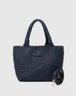 The Louenhide Baby Cruiser Woven Tote Bag is the epitome of laid-back elegance. To elevate a past season favourite, the Cruiser, this women's woven tote bag will add the perfect touch of texture to your capsule wardrobe. Simply carry by the comfortable top handles or attach the adjustable crossbody strap for a hands-free moment when strolling around town. Elevate your style and carry your essentials with the Baby Cruiser Woven