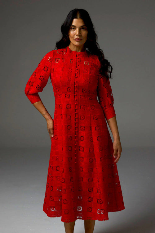 Embodying the season’s signature trend of red, the Beguile Dress in fire is both bold and feminine. With all-over lace detailing and covered buttons that run down the midi silhouette, this piece channels international runway and timeless allure.&nbsp;

Three-quarter blouson sleeves balance the look for refined elegance.

*please note, cami slip not included