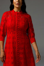 Embodying the season’s signature trend of red, the Beguile Dress in fire is both bold and feminine. With all-over lace detailing and covered buttons that run down the midi silhouette, this piece channels international runway and timeless allure.&nbsp;

Three-quarter blouson sleeves balance the look for refined elegance.

*please note, cami slip not included