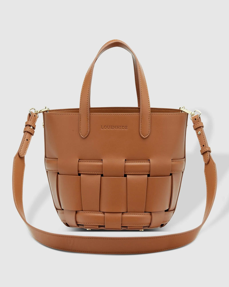 The Louenhide Bettina Bucket Bag is the epitome of seasonless style. The classic woven vegan leather detailing elevates your style by adding a touch of elegance and texture to the bucket bags’ silhouette. For hands-free convenience or a grab-and-go moment, enjoy the freedom to choose your carrying style; either by the top handles or over the shoulder with the detachable crossbody strap. The Louenhide Bettina Bucket Bag will ensure you're prepared for whatever your day may hold.