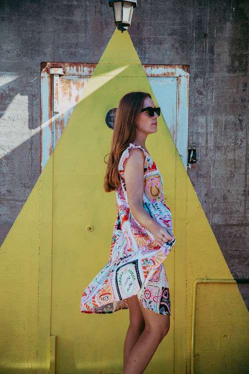Our 100% cotton Rodeo Print fabric is perfect in this fun, tiered, V necked little sundress with it's frilled armhole giving you a great little go-to in our warmer months.