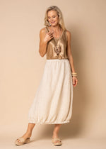 Welcome a fresh take on casual dressing with the Clover Skirt in Latte. Created from 100% linen, this fully lined skirt is a wardrobe essential for the fashion-forward woman. Featuring a unique cocoon shape and an elasticated waistband, Clover unites style and adaptability.