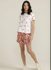A fun 100% linen in chilli print fabric is used in these cute elasticised and drawstring waisted shorts. Pockets have also been included. Wear with our matching button through shirt or chose from our white tee with chilli embroidery or our striped tees in green. There is also a white knitted top or plain red linen shirt if that's more your style.