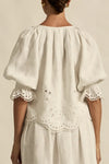  fresh approach to volume and texture, the dawn top offers bespoke embroidered artistry in a tonal hue.

100% linen finished in a tonal spring hue
bespoke embroidered hem and sleeve in floral motif
tuck detailing around the neckline for a soft drape
elbow-length blouson sleeve with elastic cuff
rounded with a delicate button feature