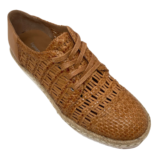If you have a hard to fit foot with lumps and bumps that need cradling, then this is the shoe for you! The plaited and woven leather moulds around the foot immediately and the openness lets your foot breath in the summer months. The rope and white sole is great both visually and comfort wise. Colour is tan.