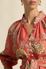 designed for comfort and versatility, it blends feminine form with a fluid feel.
• 100% breathable linen crafted for trans-seasonal wear
• high stand collar and soft 3/4 sleeve for balance
• elasticated cuffs and shell buttons provide practical detail
• off-the-body fit and wide belt for personalised styling
• versatile for everyday, travel, or elevated casual