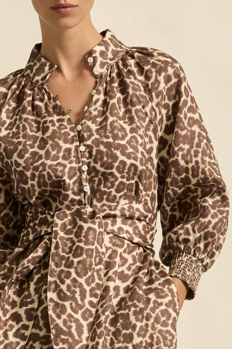 designed for comfort and versatility, it blends feminine form with a fluid feel. crafted in the zk exclusive ocelot print, a neutral take on the classic leopard trend.

100% linen crafted for trans-seasonal wear
high stand collar and soft 3/4 sleeve for balance
elasticated cuffs and shell buttons provide practical detail
off-the-body fit and wide belt for personalised styling
versatile for everyday, travel, or elevated casual