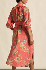 crafted in pure linen, it pairs tailored notes with natural flow—ideal for warm weather and versatile wear.
• 100% lightweight linen for breathability
• rounded high stand collar with shell button detail
• 3/4 blouson sleeve with elastic cuff
• wide self-tie belt offers versatile shaping
• relaxed silhouette with side split for ease of movement
• effortless for daywear, polished for occasion