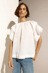 The Flout top is a study in relaxed sophistication, featuring a gathered neckline and pintuck details on the sleeves that create a modern silhouette. Its raglan sleeve offers a laid-back elegance, making it a perfect choice for easy, everyday wear.&nbsp;

This top transitions seamlessly from work to weekend with its refined simplicity.

composition: 100% ramie
softly gathered neckline is flattering and feminine
pintuck detail on a flutter style sleeve