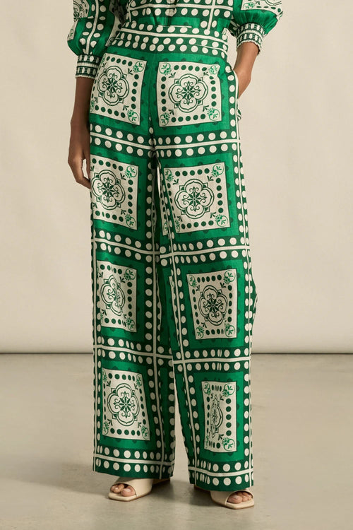 Designed for elevated ease, the gesture pant pairs a full-length silhouette with subtle structure and refined detail.&nbsp;

100% linen
full-length shape with soft movement
seamless front for a polished look
flat front waist band with an elasticated rear
side zip with clasp and elasticated back waistband
functional side pockets
fresh seasonal print
style with the pixel top for effortless coordination