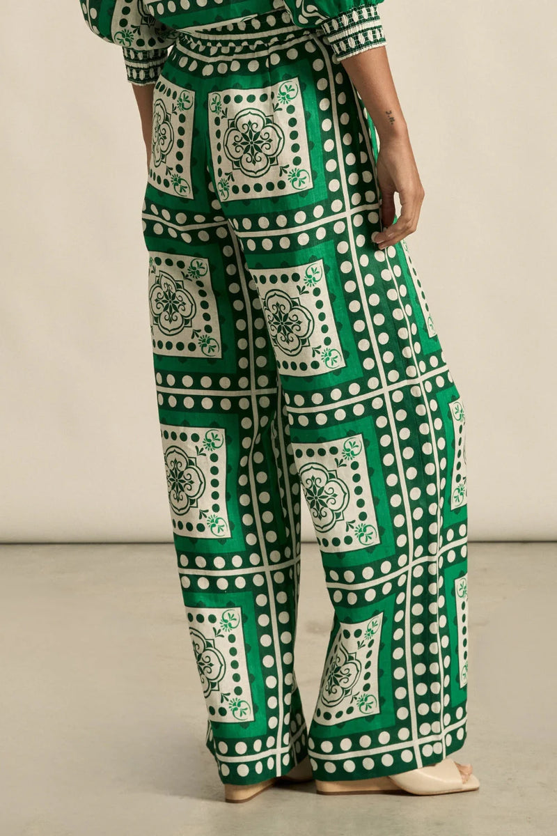 Designed for elevated ease, the gesture pant pairs a full-length silhouette with subtle structure and refined detail.&nbsp;

100% linen
full-length shape with soft movement
seamless front for a polished look
flat front waist band with an elasticated rear
side zip with clasp and elasticated back waistband
functional side pockets
fresh seasonal print
style with the pixel top for effortless coordination