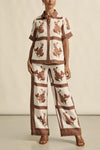 100% linen
full-length shape with soft movement
seamless front for a polished look
flat front waist band with an elasticated rear
side zip with clasp and elasticated back waistband
functional side pockets
fresh seasonal print
style with the pixel top for effortless coordination