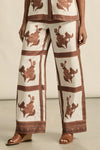 100% linen
full-length shape with soft movement
seamless front for a polished look
flat front waist band with an elasticated rear
side zip with clasp and elasticated back waistband
functional side pockets
fresh seasonal print
style with the pixel top for effortless coordination