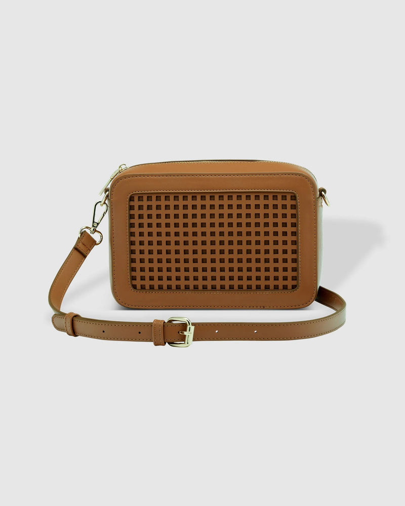 The Louenhide Giselle Crossbody Bag is designed to elevate your everyday style, with its classic camera bag shape and subtle yet impactful features. Add a touch of textural intrigue to your look with the square lattice inspired panel detailing, transforming a classic silhouette into a style statement, ideal for any occasion. Redefine your look with this everyday women’s crossbody bag that effortlessly blends practicality with sophistication.