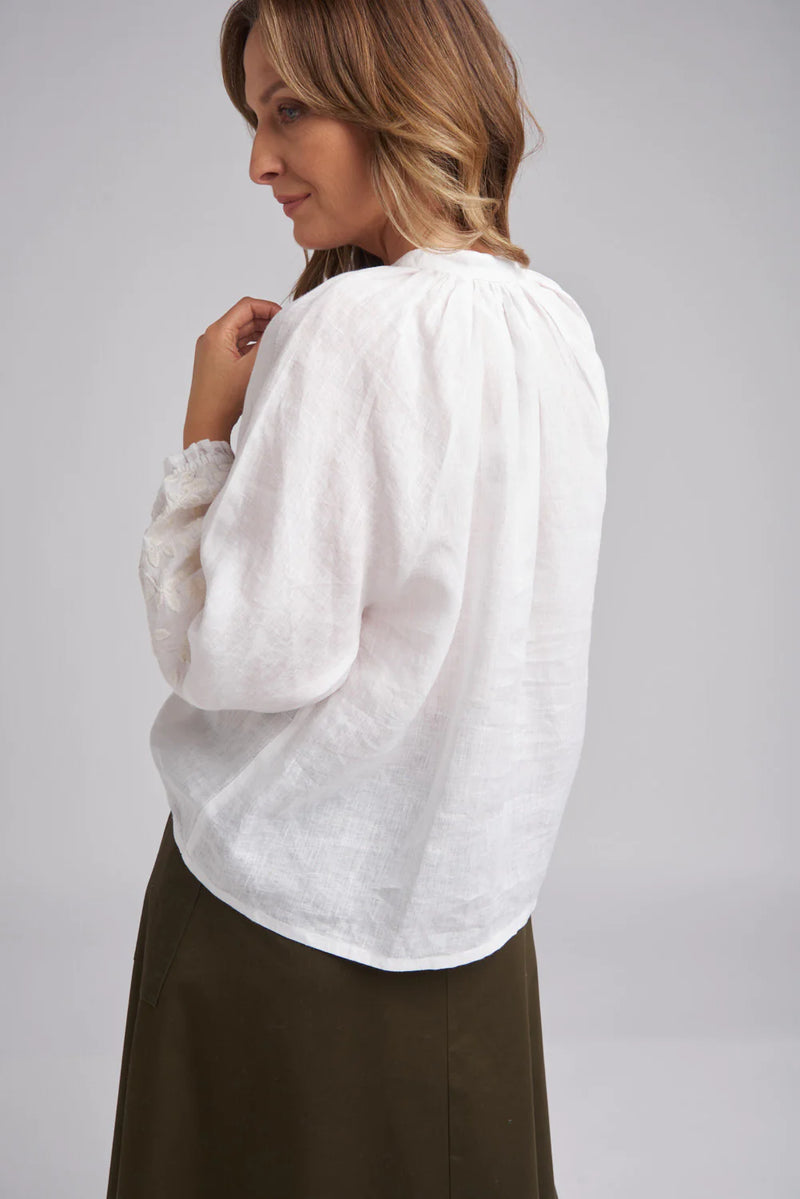 • 100% Linen • Relaxed Fit • Soft Gathering Around Neck Band • Sell Buttons • Raglan Sleeve 3/4 length with Elasticated Cuff • Sleeve Hem Line Embroidered • Back Hem Line Curved