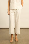 Crafted in 100% cotton poplin, the Harbour pant is elevated with custom ladder-lace embroidery that flows into a scalloped cropped hem. A neat, flat waistband creates a clean and tailored fit, balancing femininity with structure. Designed for versatility, it pairs seamlessly with the pier top for a French-inspired set that feels timeless and modern.

100% cotton poplin
custom ladder-lace embroidery
scalloped cropped hem for refined finish
neat-fitting, flat waistband for structure
pairs perfectly with the p
