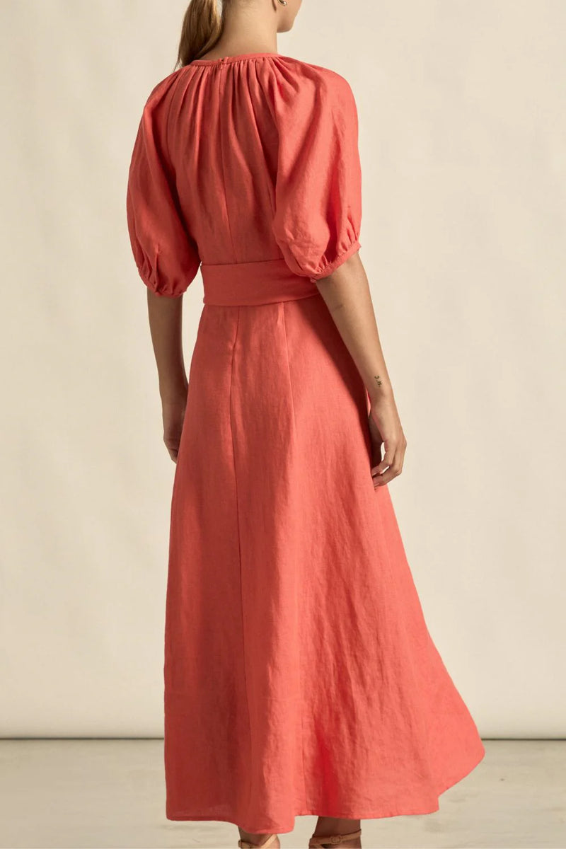 laxed yet refined.
• crafted in 100% linen
• fit-and-flare maxi silhouette
• v-split neckline with bound finish
• raglan 3/4 sleeve with gathered volume
• wide self-fabric belt with angled ends
• lace panel at bib for artisanal appeal
• centre back zip for clean closure
• ideal for travel, leisure, or warm days ahead
