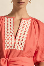 laxed yet refined.
• crafted in 100% linen
• fit-and-flare maxi silhouette
• v-split neckline with bound finish
• raglan 3/4 sleeve with gathered volume
• wide self-fabric belt with angled ends
• lace panel at bib for artisanal appeal
• centre back zip for clean closure
• ideal for travel, leisure, or warm days ahead