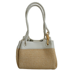 This cute little grab bag in raffia and milk leather also comes with a shoulder strap and an extra zipped leather pouch, Measures 21cm x 14cm x 15cm