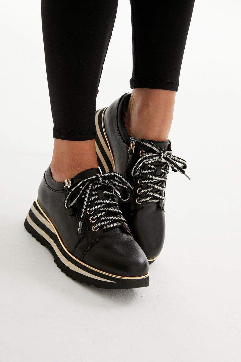 <p>How cool are these leather sneakers! Stripe detail through the 5cm high sole, two tone laces and with a gold metal rand give these just the right amount of edge.&nbsp; Double zips for super easy on/off too.&nbsp;&nbsp;</p> <p>Alfie &amp; Evie</p>