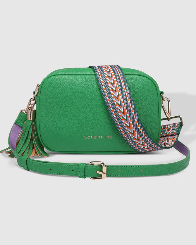 1440 × 1800px The Louenhide Jacinta Crossbody Bag is the ultimate cool-girl bag, featuring a complimentary detachable guitar strap. feel luxe and sporty with our Jacinta over your shoulder. Walk out in style with a fun tassel feature and secure your essentials with its slip and zip pockets. Available in a range of classic & preppy colours and designed to style effortlessly with your daily wardrobe.